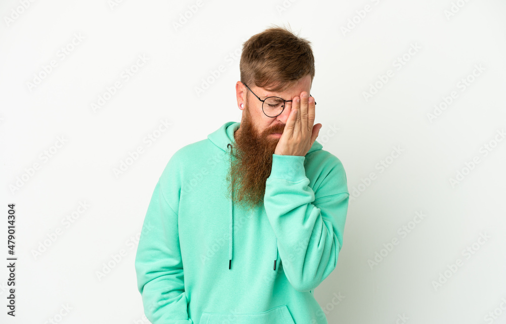 Young reddish caucasian man isolated on white background with headache Young reddish caucasian man isolated on white background with headache