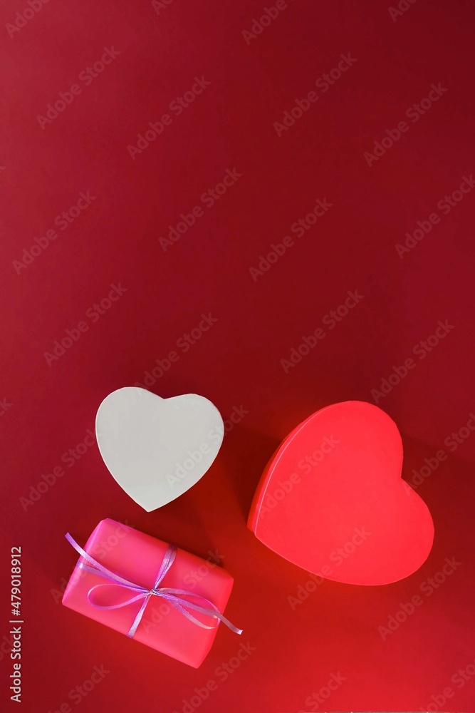 red and white hearts on a red background