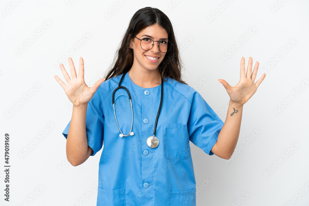 Young surgeon doctor caucasian woman isolated on white background counting ten with fingers Young surgeon doctor caucasian woman isolated on white background counting ten with fingers