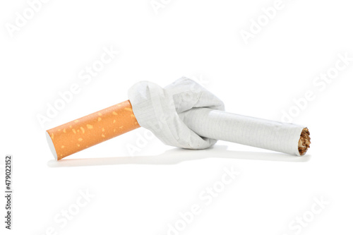 Cigarette tied in a knot for stop smoking concepts       photo