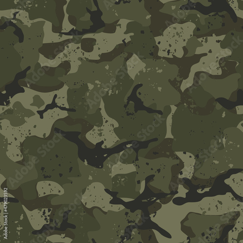 Seamless camouflage pattern of spots. Modern camo. Military texture. Print on fabric and clothing. Vector illustration