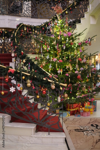 christmas tree with red ribbon