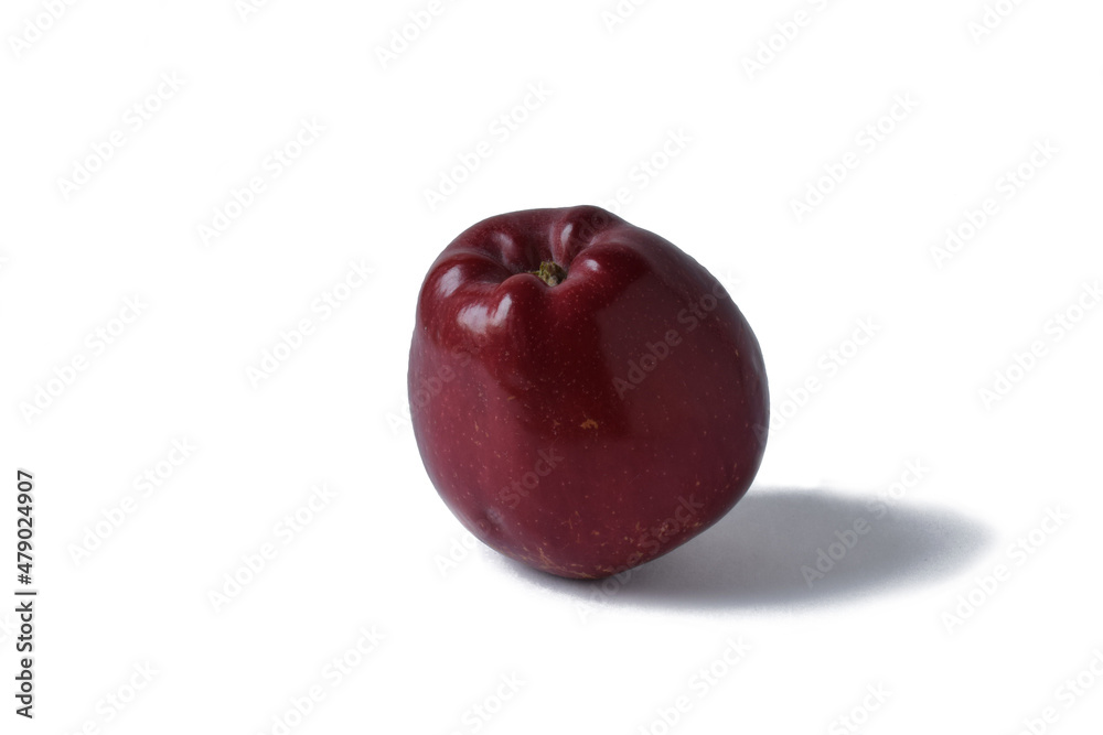 A fresh red apple is highlighted on white. With trajectory cropping. copy space A fresh red apple is highlighted on white. With trajectory cropping. copy space