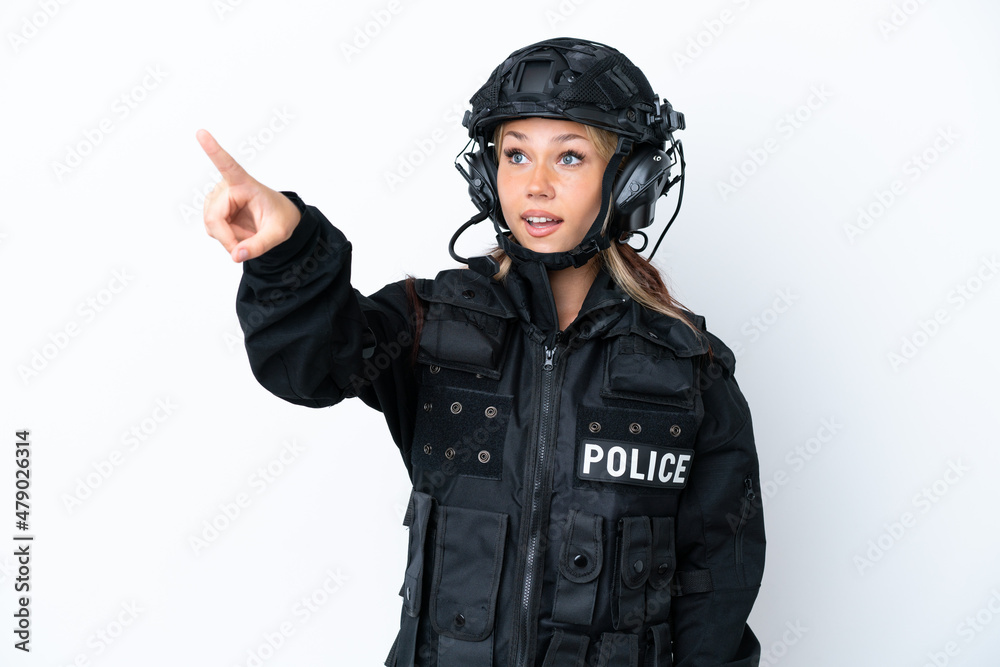 SWAT Russian woman isolated on white background pointing away SWAT Russian woman isolated on white background pointing away