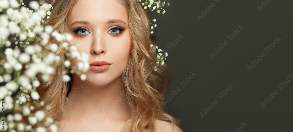Young woman face on black banner background