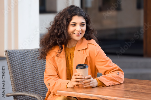 Beautiful woman drinking te...