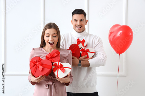 Happy young couple with gif...