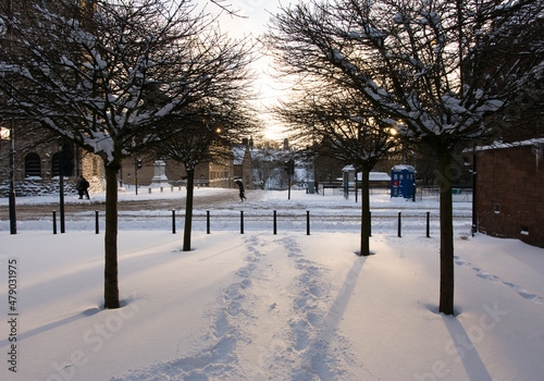Commuters trudge through the snow on Castle Street, Glasgow, Scotland.