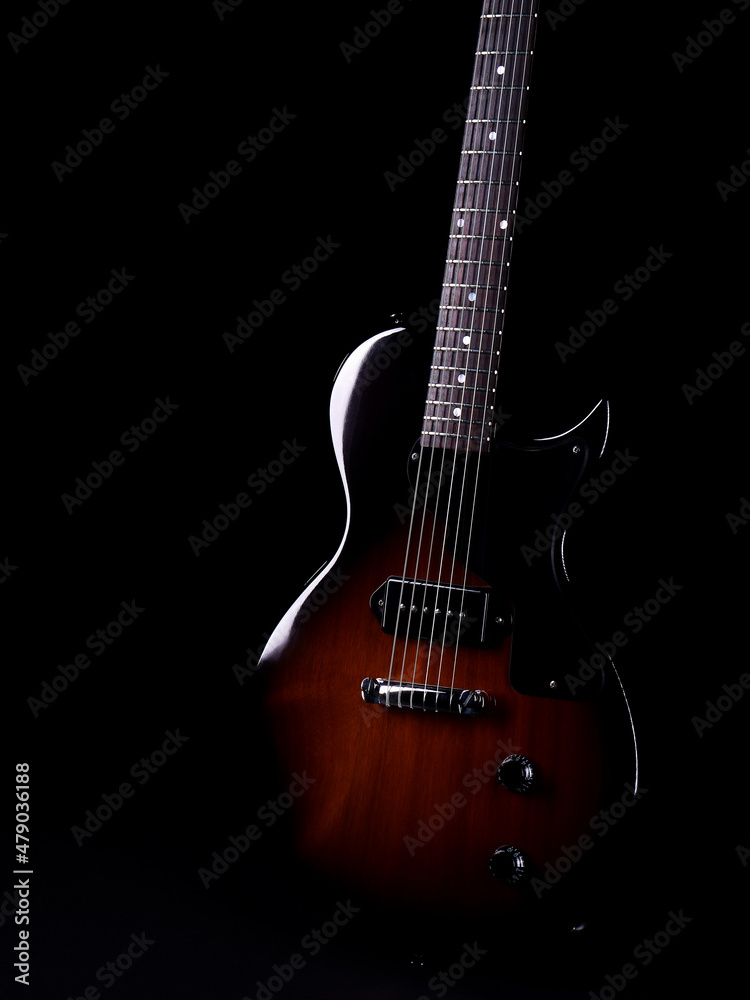 Electric guitar isolated on black