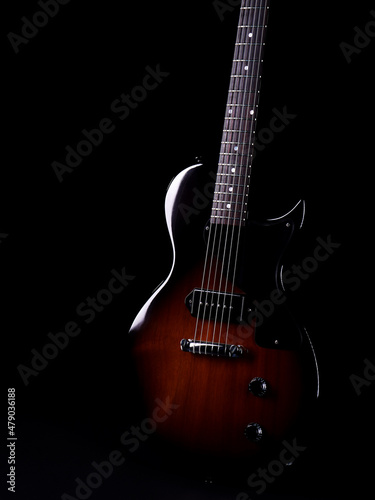 Electric guitar isolated on black