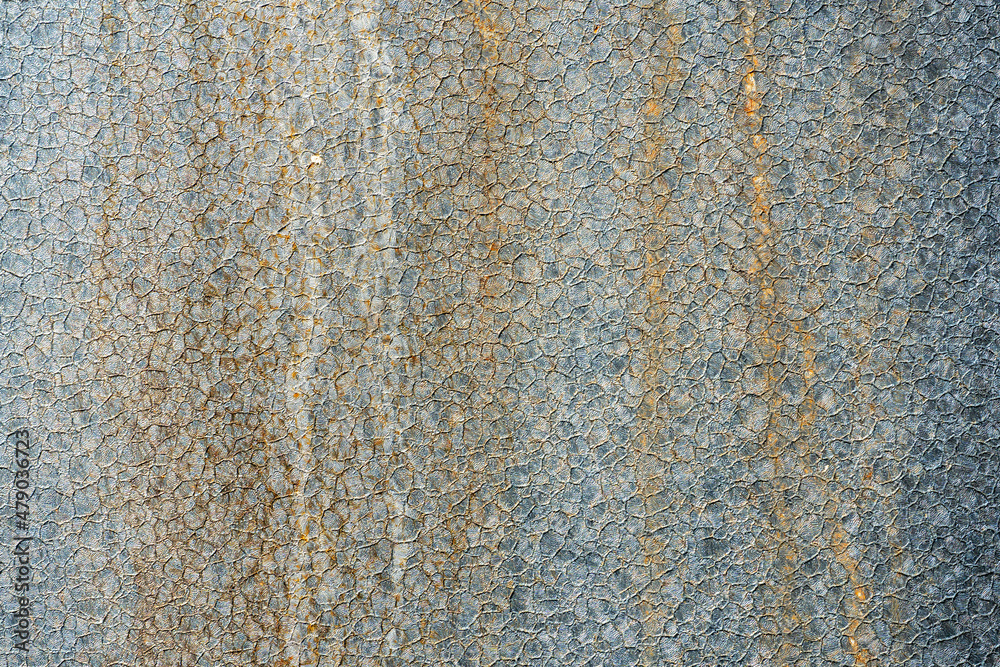 An empty concrete surface with cracks and traces of old paint. The background is a painted old wall. A place to insert text or design. An empty concrete surface with cracks and traces of old paint. The background is a painted old wall. A place to insert text or design.
