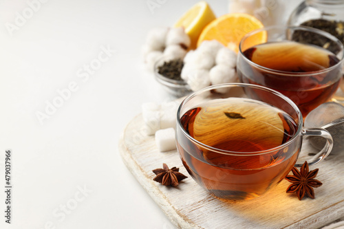 Fototapeta Concept of hot drink with tea on white background