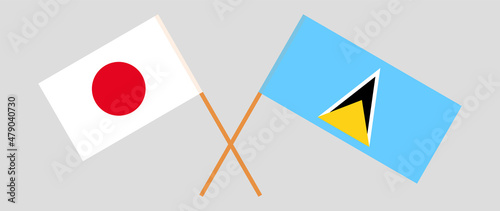 Crossed flags of Japan and Saint Lucia. Official colors. Correct proportion