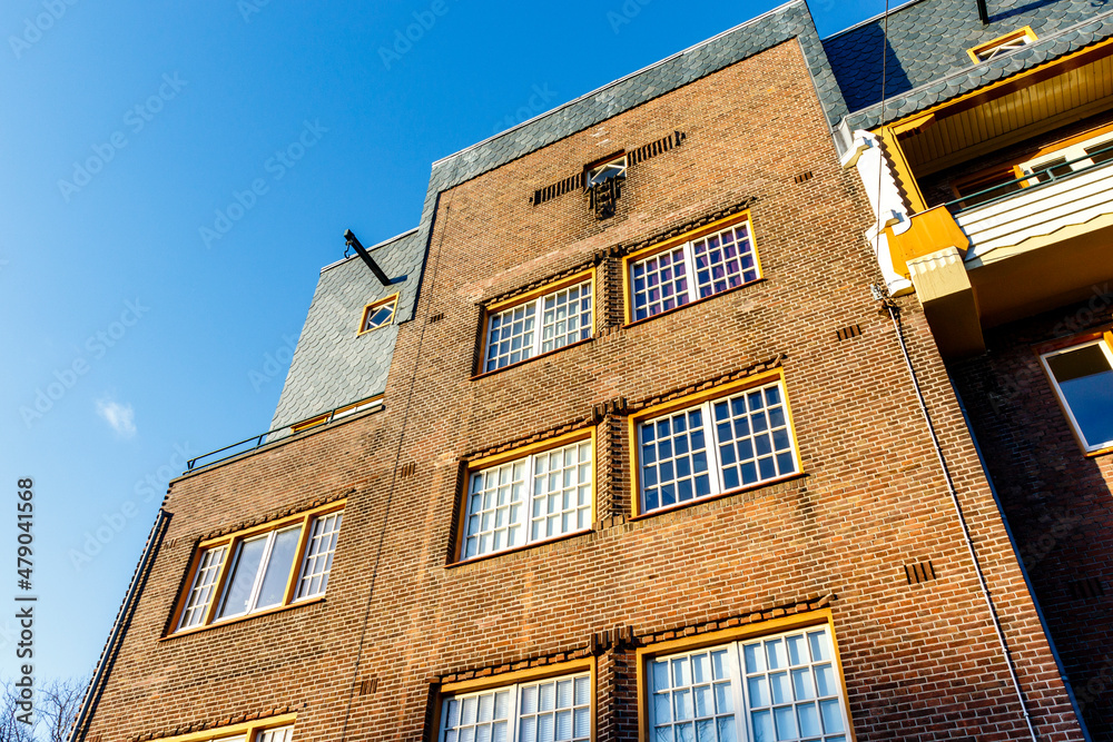 Obraz premium Facade of an ornate apartment building in the Amsterdamse School style in Amsterdam Zuid, The Netherlands, Europe