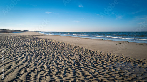 Seascape with undulating rippled sand bar surface at Scoton Neck Beach in Cape Cod Bay in Massachusetts