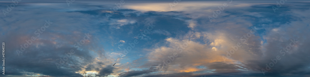 Dark blue sunset sky panorama with golden Cumulus clouds. Seamless hdr 360 pano in spherical equirectangular format. Full zenith for 3D visualization, game, sky replacement in aerial drone panoramas.