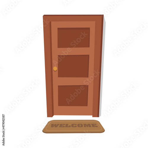 Closed wooden door with rug welcome