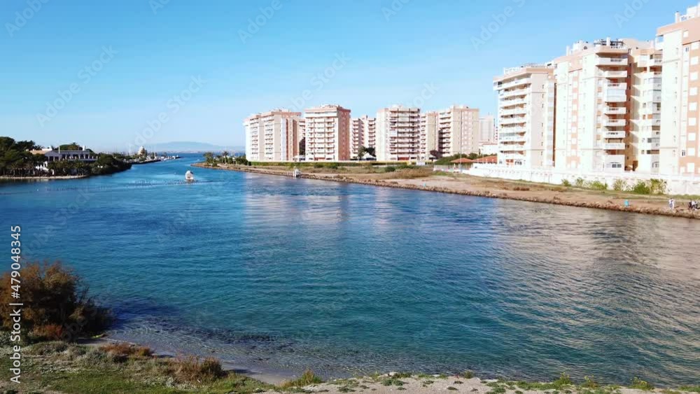 Europe, Spain , Murcia, La Manga January 2022 - modern buildings with private pools near the sea Europe, Spain , Murcia, La Manga January 2022 - modern buildings with private pools near the sea