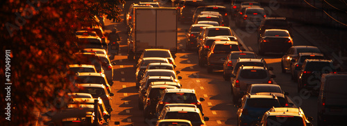 Traffic jam at sunset. Paralyzed traffic on city streets. photo
