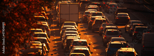 Foto Traffic jam at sunset. Paralyzed traffic on city streets.
