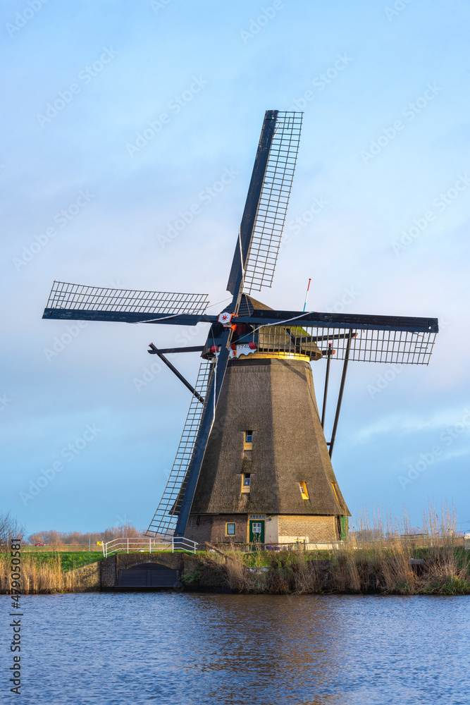 Windmills on a very cloudy day at Kinderdijk in The Netherlands.