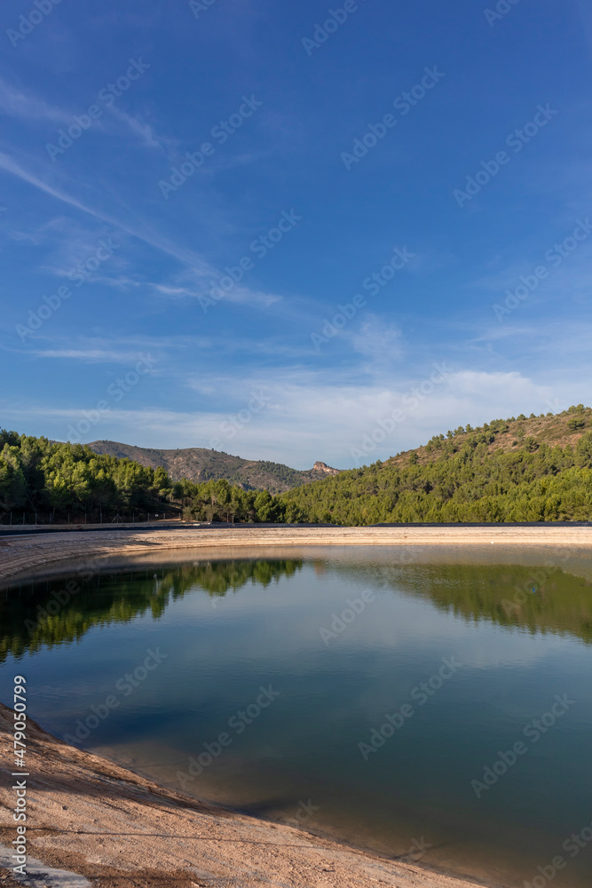 Artificial lake and cultivation of manranges in Algar de Palancia in the Valencian community, Spain. Close to Valencia Spain.