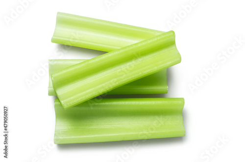 Fresh sliced celery isolated on white background. Cooking ingredients.