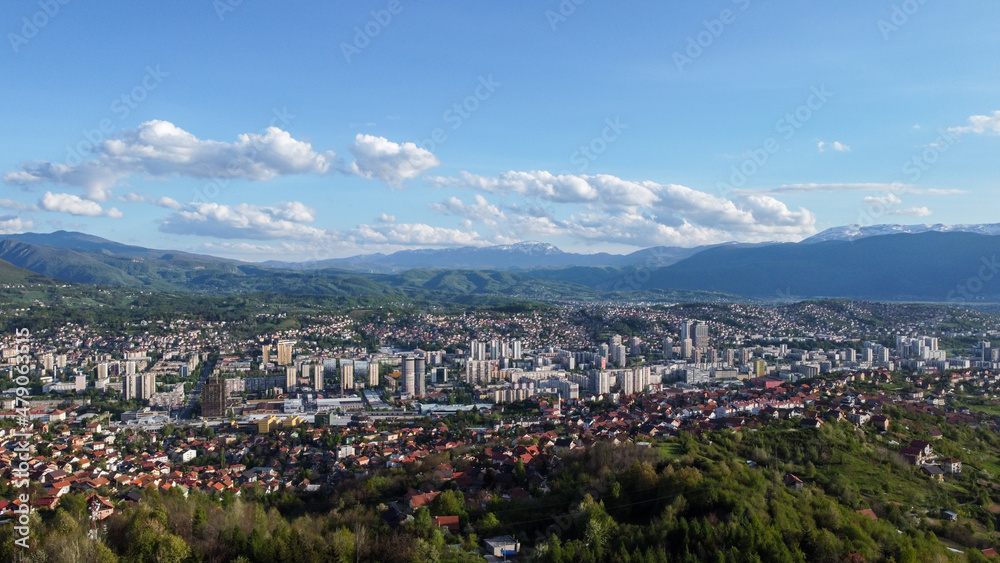 Aerial drone view of city of Sarajevo. Capital of Bosnia and Herzegovina.  Mountains in distance. 