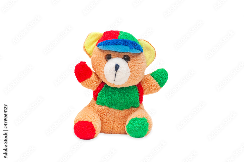 A teddy bear toy sits on a white background. Isolated children's toy on a white background. A teddy bear toy sits on a white background. Isolated children's toy on a white background.