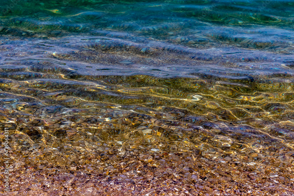 Obraz premium Perfect clear sea water and seabed near shore. Enticing view of clear sea water and seabed
