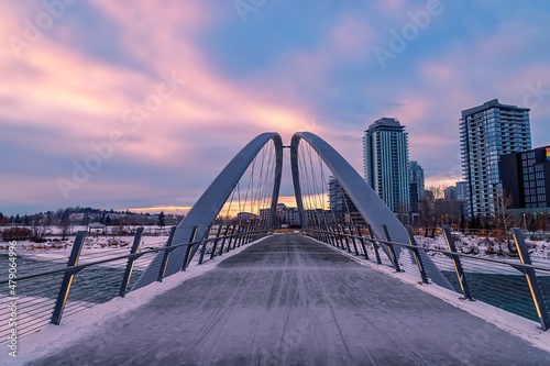 Sunrise Clouds Over A Downtown Calgary Bridge