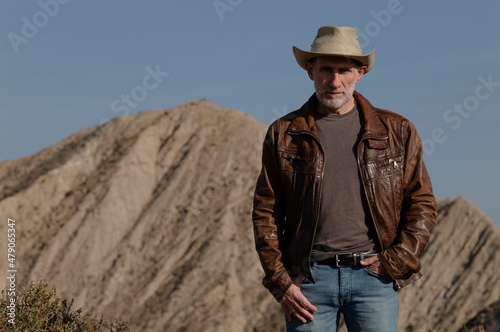 Adult man in cowboy hat in Tabernas Desert  Almeria  Spain