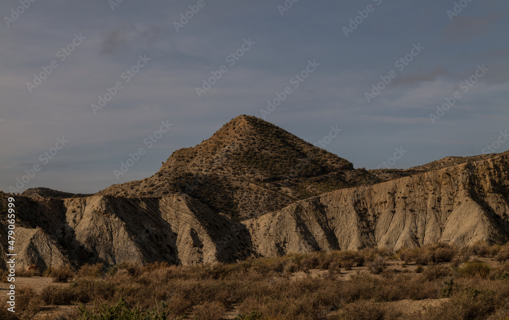 Landscape of Tabernas Desert, Almeria, Spain, against cloudy sky