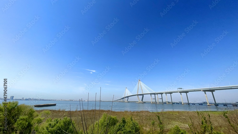 Arthur ravenel jr. bridge over water Cooper River in South Carolina, US, connecting downtown Charleston to Mount Pleasant. Arthur ravenel jr. bridge over water Cooper River in South Carolina, US, connecting downtown Charleston to Mount Pleasant.