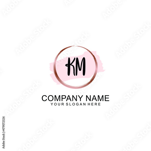 KM Initial handwriting logo vector. Hand lettering for designs