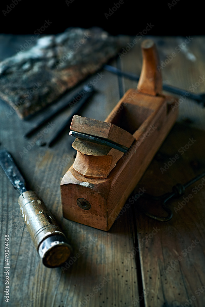 Old Carpentry Tools on wooden background
