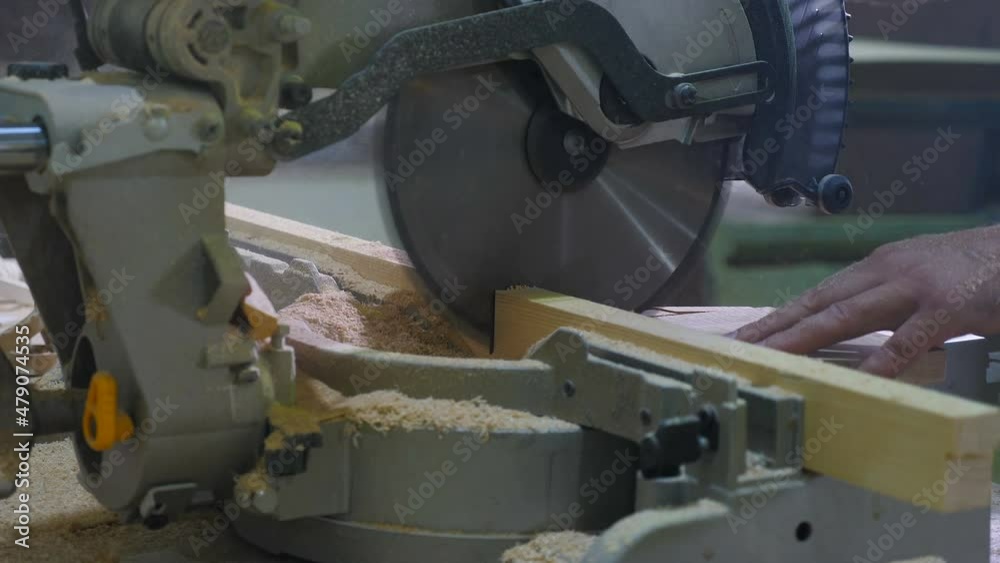 Furniture production. Woodworking concept. Cutting wood with CNC milling machines. Production process in furniture factory, woodworking machine mechanism, close up. Workflow in furniture factory. 4 k