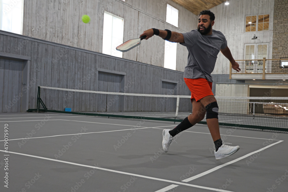 Fototapeta premium pickleball action during a singles match