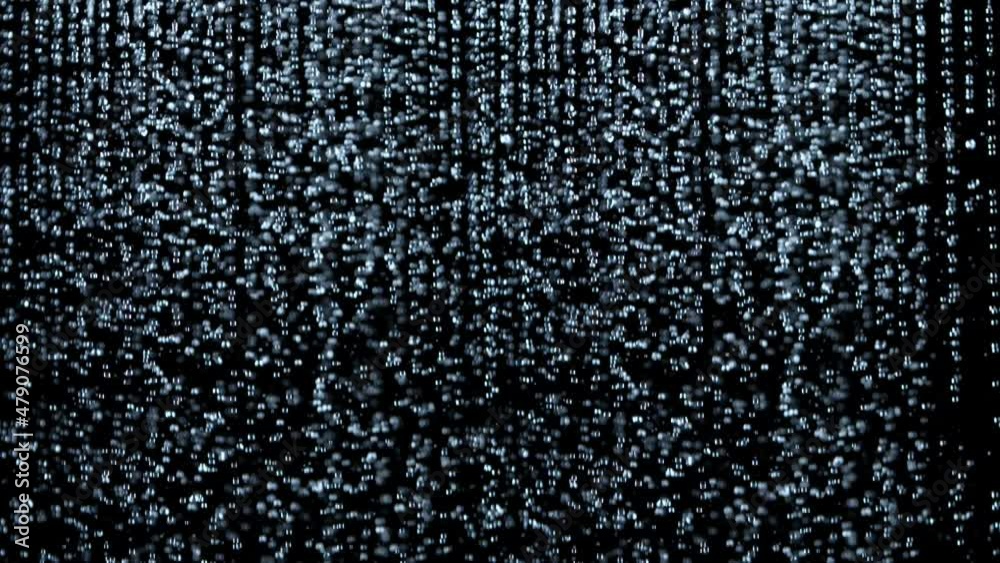 Super Slow Motion Shot of Many Water Drops Falling Down on Black Background at 1000fps.