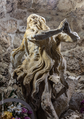 Stone sculpture of St. Onuphrius, Rukomysh. Written by Pinzel photo