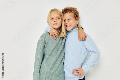 Photo of two children hug entertainment posing friendship isolated background