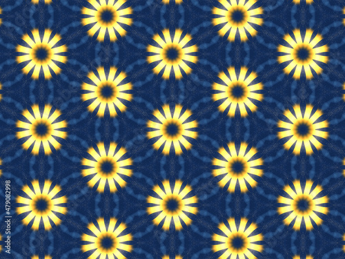 Repeating kaleidoscopic pattern with abstract flowers and light effects. A yellow/navy pattern for surface design. Concept of night and lighting. Concept of the dark and the light.