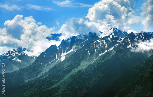  Mountain landscape. Landscape with snow-capped mountain peaks and beautiful sky