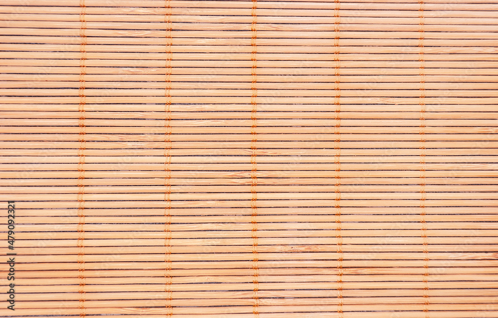 Background Texture of wooden bamboo mat for sushi making, rolls. Background Texture of wooden bamboo mat for sushi making, rolls.