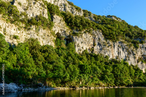 The green banks of the Pont dArc in the Gorges de lArdeche in Europe  France  Ardeche  in summer  on a sunny day.