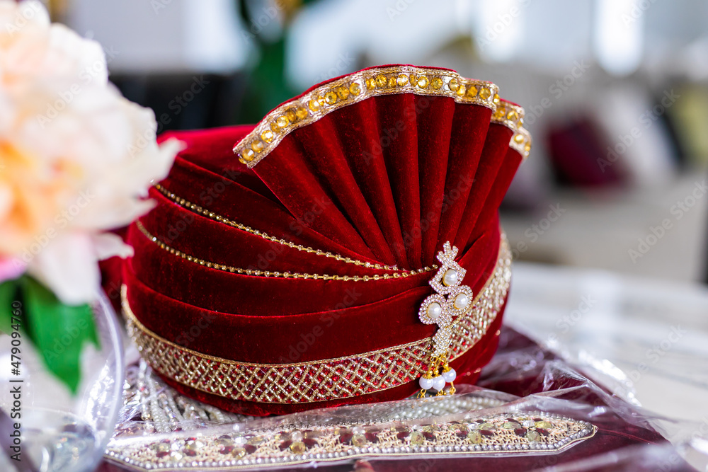 Indian Punjabi groom's red wedding hat turban