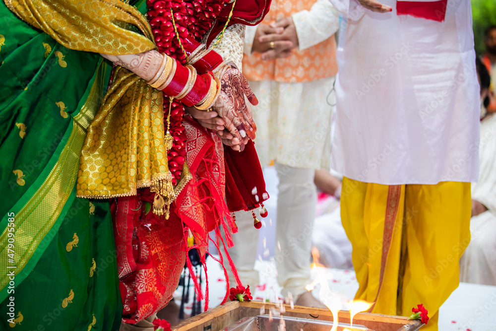 Indian Hindu wedding ceremony ritual items, hands and feet close up