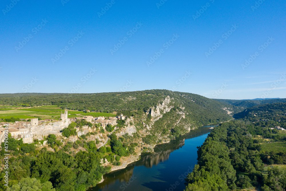 The town of Aigueze on the edge of the Ardeche in the countryside in Europe, France, Ardeche, in summer, on a sunny day.