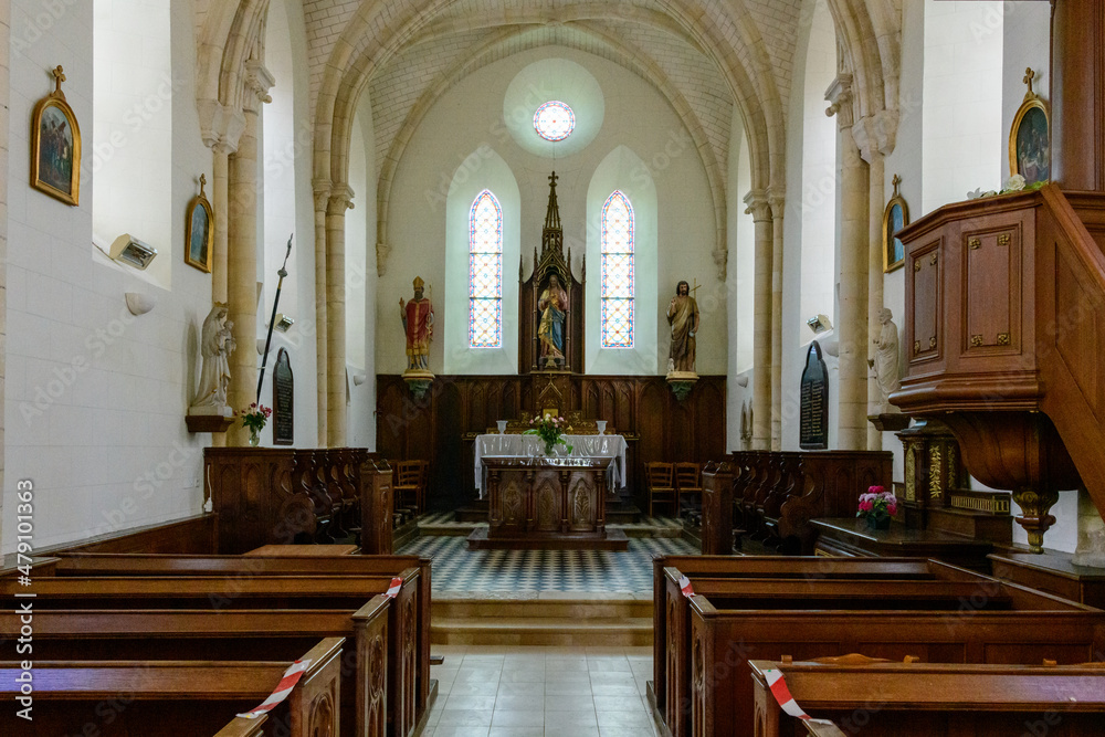 The interior of the church in the traditional French village of Saint Sylvain in Europe, France, Normandy, towards Veules les Roses, in summer on a sunny day.