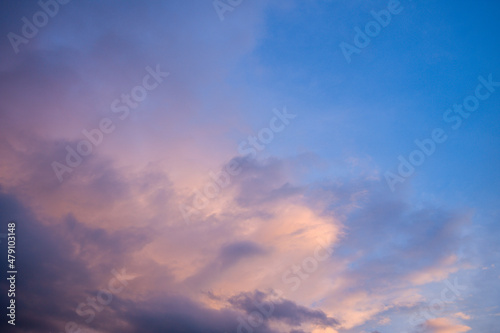 The beautiful pink clouds above the beach of the Mediterranean Sea in Europe, France, Occitanie, Herault, in summer, on a sunny day.